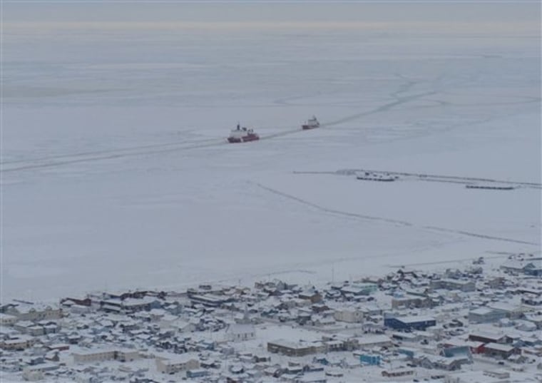 The Coast Guard cutter Healy guides the Russian tanker Renda closer to the fuel transfer mooring point in Nome, Alaska, on Saturday.